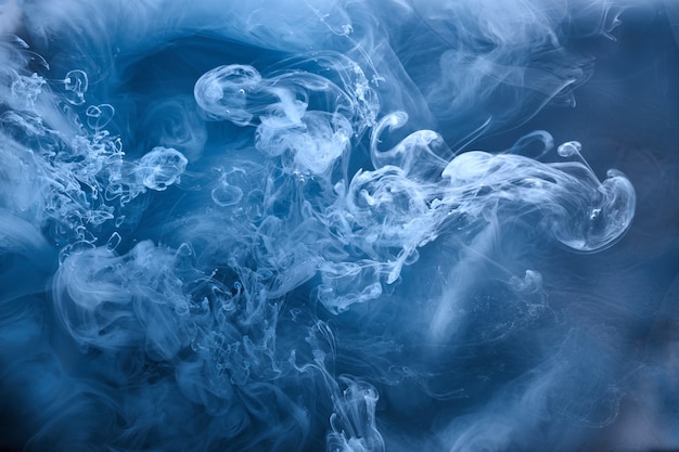 Abstract blue ocean sea background, indigo ink sky, liquid azure paint underwater, swirling smoke wallpaper