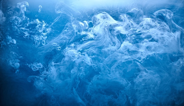 Abstract blue ocean sea background, indigo ink sky, liquid azure paint underwater, swirling smoke wallpaper