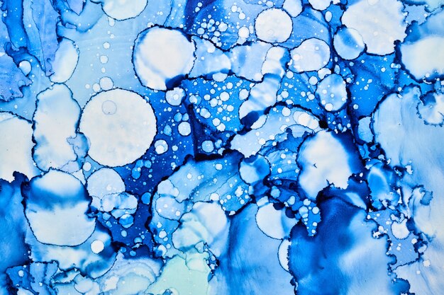 Abstract blue paint background. Water bubbles drops stains splashes texture pattern