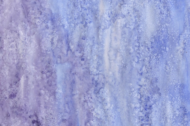 Abstract blue and violet watercolor background with texture effect