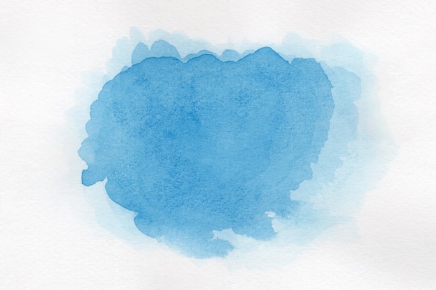 白い背景に抽象的な青い水彩紙に飛び散る色手描きです