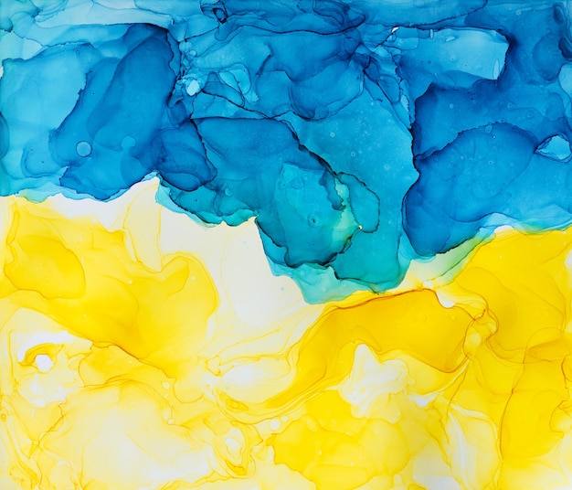 Abstract blue and yellow fragment of colorful background wallpaper Mixing acrylic paints Modern