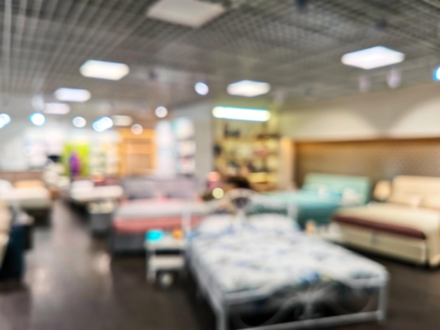 Abstract blur background of family shopping on furniture store sales season