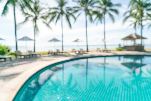 абстрактный размытия кровать бассейн вокруг бассейна в роскошном отеле курорта