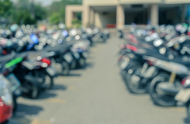 Foto priorità bassa astratta di parcheggio del motociclo della costruzione della sfuocatura