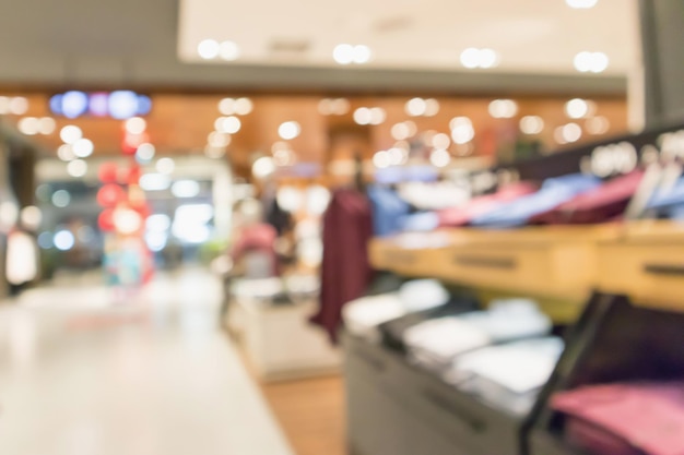 Abstract blur clothing boutique display interior of shopping mall background