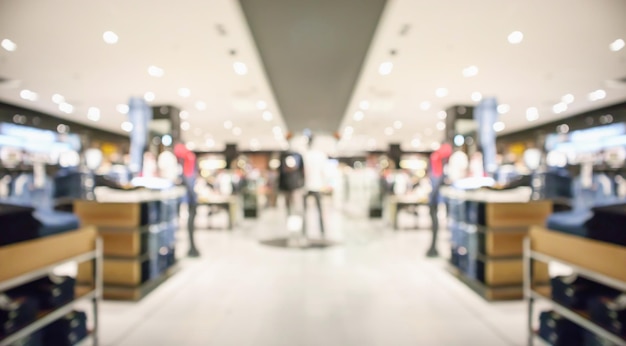 Abstract blur clothing boutique display interior of shopping mall background