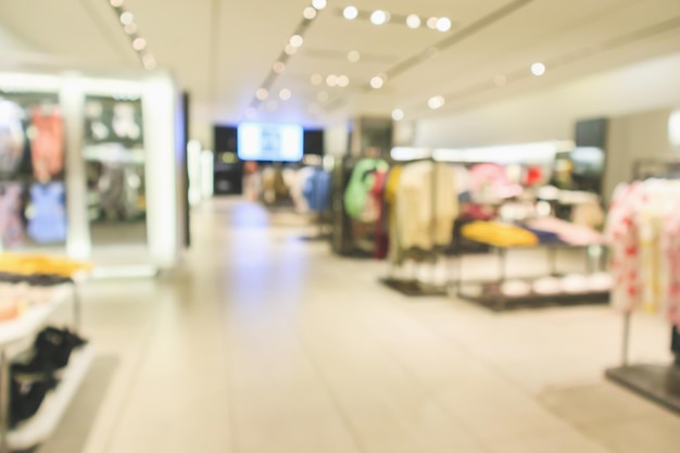 Photo abstract blur clothing boutique store display interior of shopping mall background