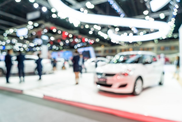 Sfuocatura astratta ed esposizione di manifestazione di mostra dell'automobile e dell'automobile defocused