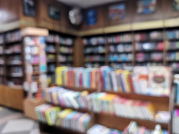 Photo abstract blur front book store defocused for background usage stack of book and bookshelf in book store