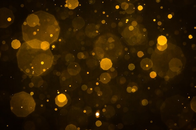 Photo abstract blur gold sparkle bokeh background