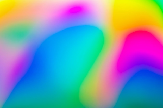 Abstract blur holographic rainbow foil iridescent background