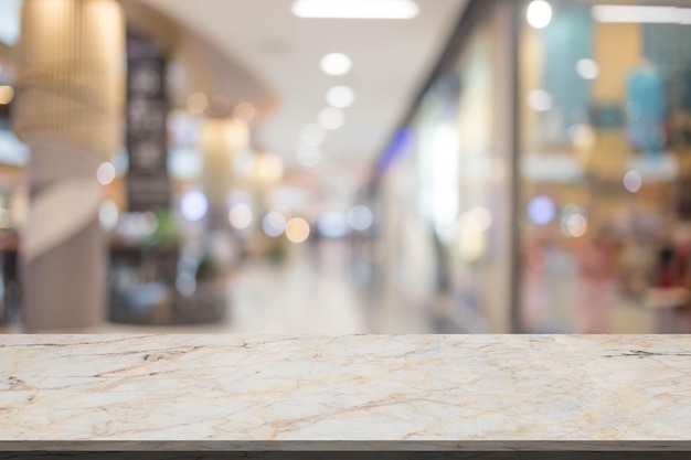 Abstract blur image of People walking at shopping mall or exhibition hall with bokeh for background usage