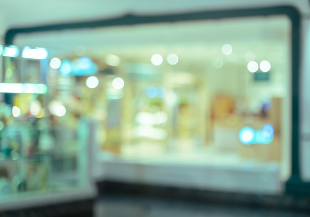 Immagine astratta della sfocatura della luce del bokeh del fondo interno del centro commerciale o del grande magazzino