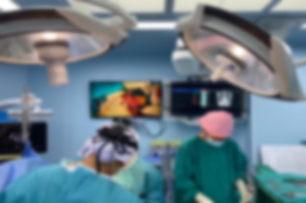 Abstract Blur Medical Team Performing Surgical Operation in hospital operating. The medical team doing the critical operations.Medical concept.