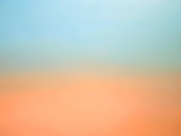 Фото Абстрактный размытый оранжевый и синий градиентный фон