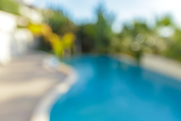 Abstract blur outdoor swimming pool in hotel resort