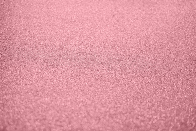 Sfocatura astratta glitter oro rosa scintilla bokeh sfocato sfondo chiaro