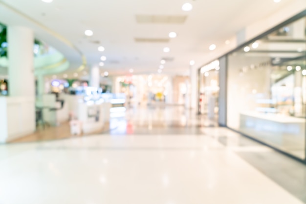 Photo abstract blur shop and retail store in shopping mall for background