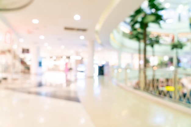 abstract blur shop and retail store in shopping mall for background