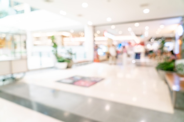 abstract blur shop and retail store in shopping mall for background