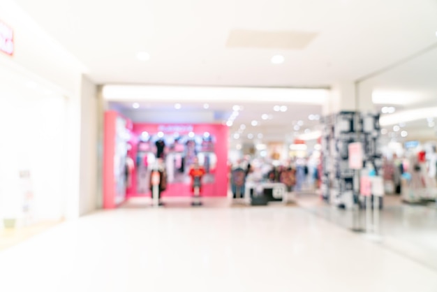 Abstract blur shop and retail store in shopping mall for\
background