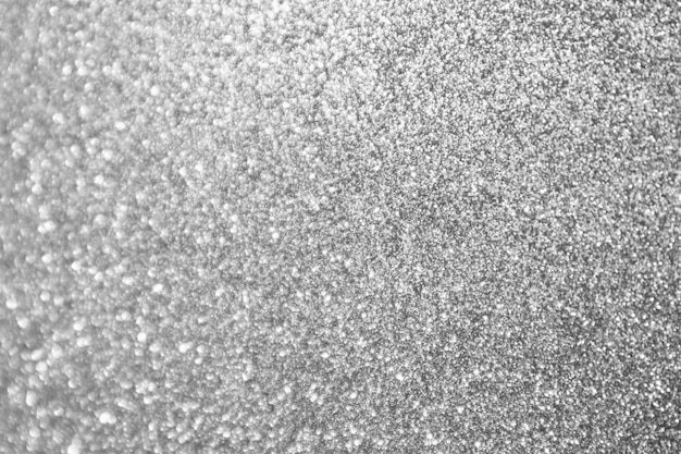 Photo abstract blur silver glitter sparkle defocused bokeh light background