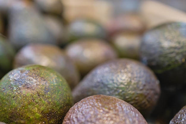 Abstract blurred background of avocado on the shelf in the market background and splash idea for advertising or shop
