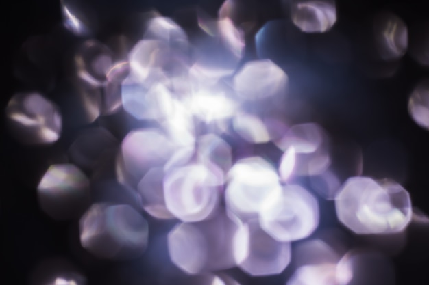 Abstract blurred bokeh background. Lens flare, holiday theme