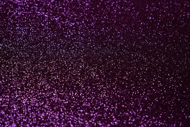 Abstract blurred glitter purple surface