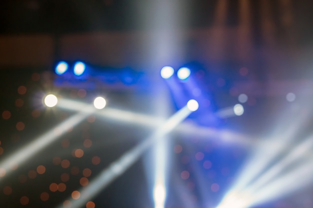 Abstract blurred photo of spotlight in conference hall