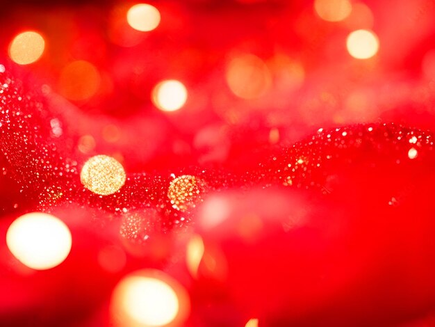 Abstract blurred of red and gold glittering shine bulbs lights background blur of Christmas hd wall