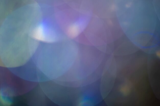 Abstract blurred shiny glitter lamp lights background.