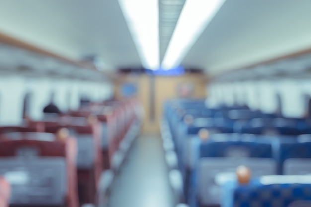 Abstract blurred train Interior of a passenger car background.