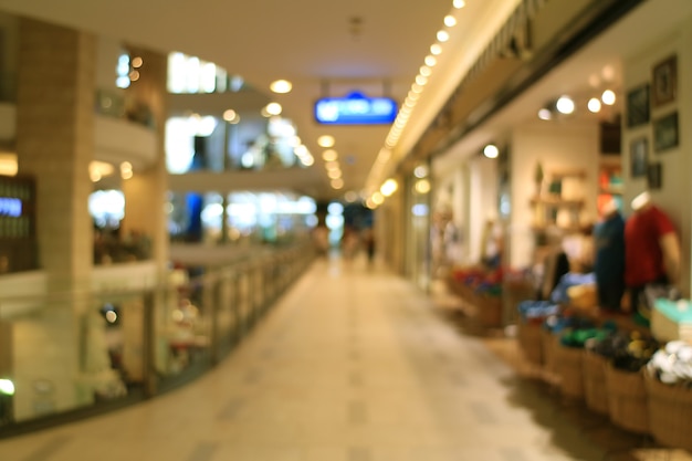 Abstract blurred of walkway in the shopping mall with bokeh lights