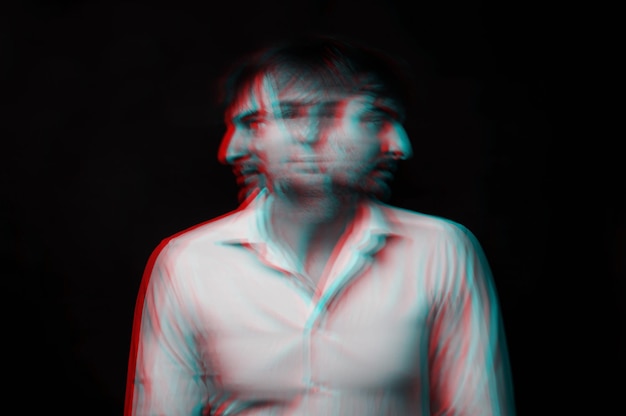 Abstract blurry portrait of a psychopathic man with schizophrenic diseases and split personality