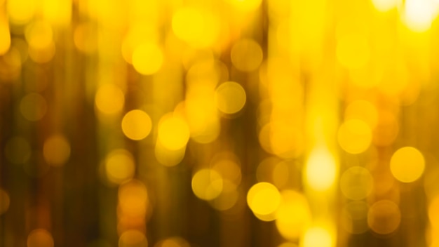 Abstract bokeh background Abstract background of bright yellow and blue lights in soft focus