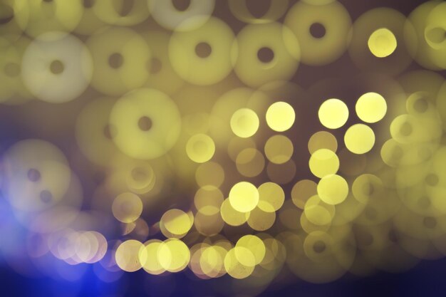 Abstract bokeh background Golden bokeh circles on a dark blue background Layer overlay