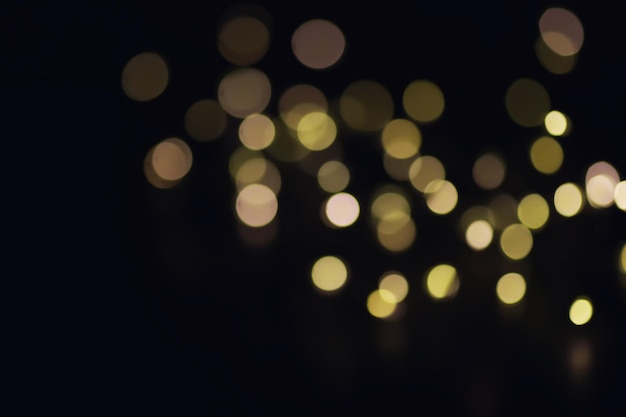 Abstract bokeh background Golden bokeh circles on a dark blue background Layer overlay