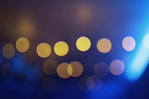 Abstract bokeh background Golden bokeh circles on dark blue background Layer overlay