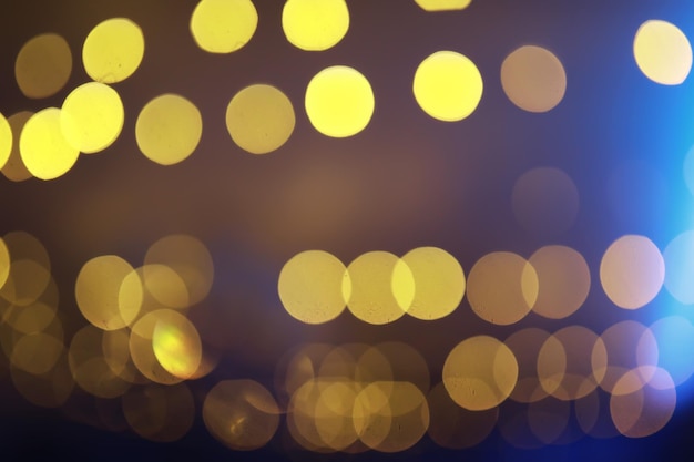 Abstract bokeh background Golden bokeh circles on dark blue background Layer overlay