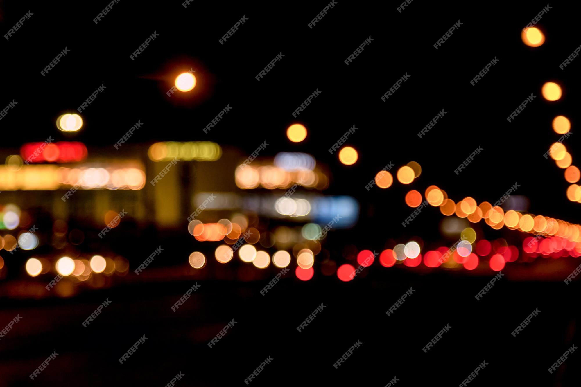 Premium Photo | Abstract bokeh background of night street with car and street lamps. city life, defocused lights from cityscape, style color tone. concept of abstract stylish urban backgrounds for design.