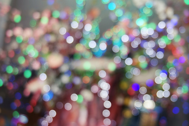 Photo abstract bokeh glitter vintage lights. christmas bokeh light defocused abstract background.can be used wallpaper texture with copy space area for a text