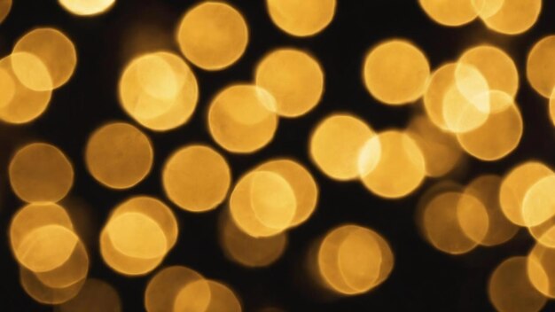 Abstract bokeh of yellow lights on black background christmas lights