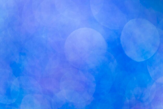 抽象的な明るい青のボケ味の背景