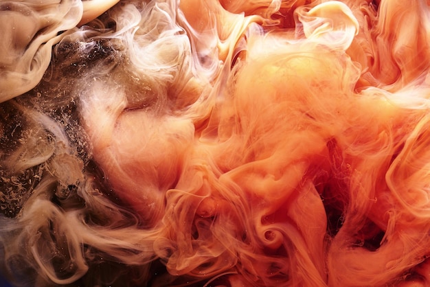 Abstract caramel silk swirling smoke background