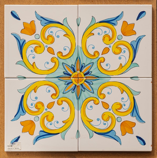 Abstract ceramic background Italian traditional patterns on tiles handmade craft painting flowers yellow and blue colors