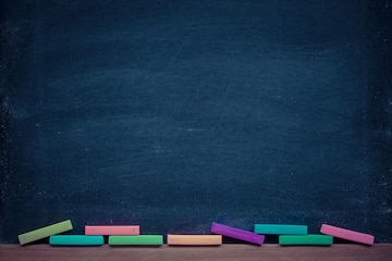 ฺBlackboard, Chalk, Crayon beautifully laid out and there is space for text  input. Concept Black to school. Stock Photo