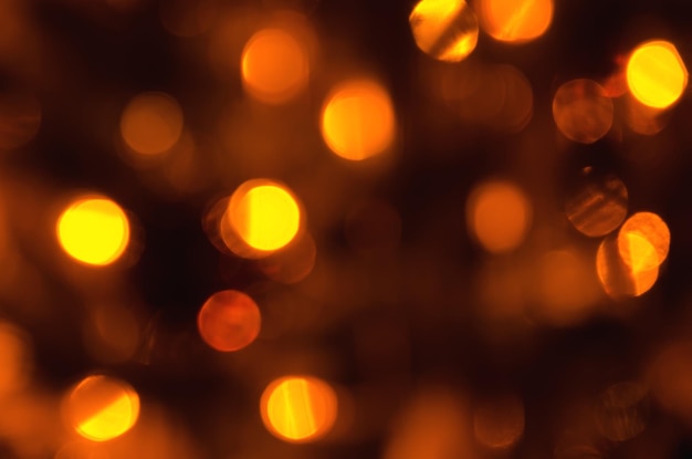 Photo abstract christmas background of blurred garland lights