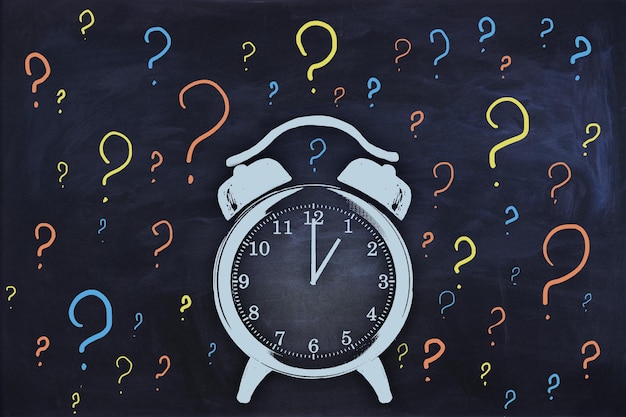 Abstract clock and question marks sketch on chalkboard wall
background time management and deadline concept